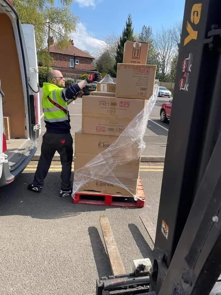 Pallets being loaded for delivery